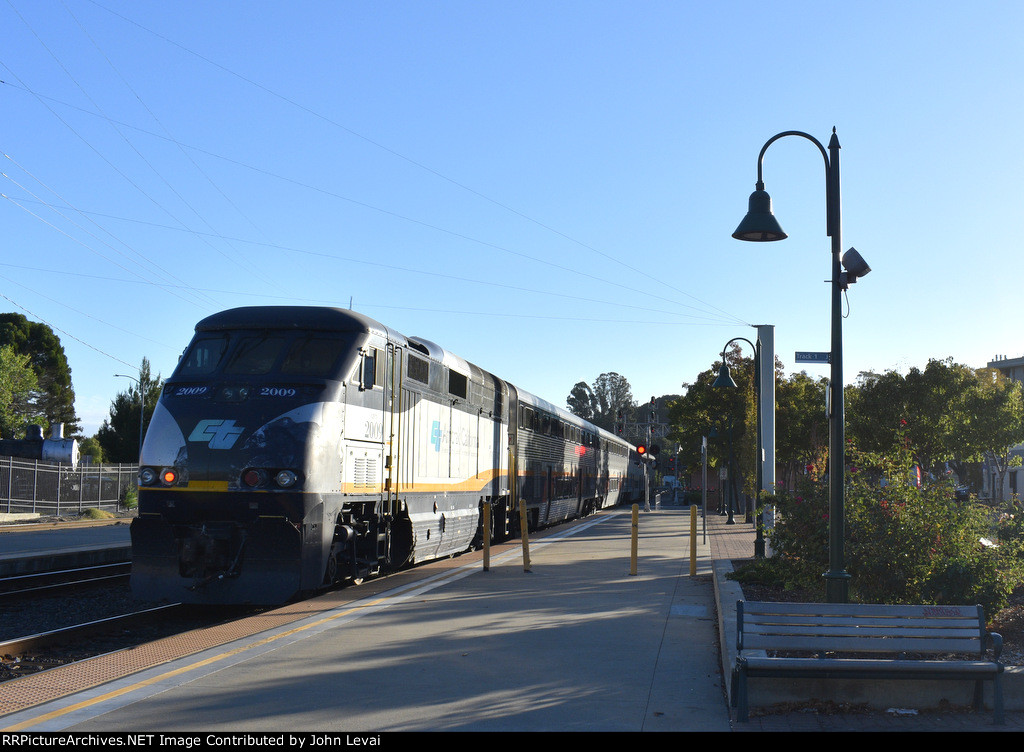 Amcal F59PHI # 2009 pushing Amtrak Train # 524 out of Martinez Station